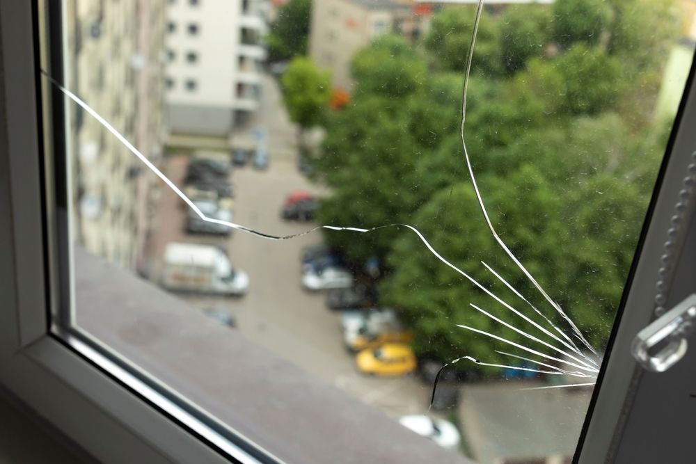 Cracked Window With Spiderweb Pattern — Southside Glass & Aluminium in Smithfields, QLD