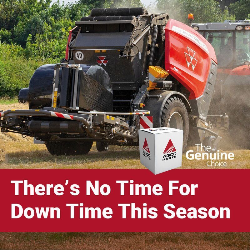 Two utility vehicles in muddy field with banner: “There’s No Time For Down Time This Season”