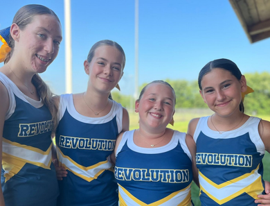 Cheerleader crew smiling for the camera