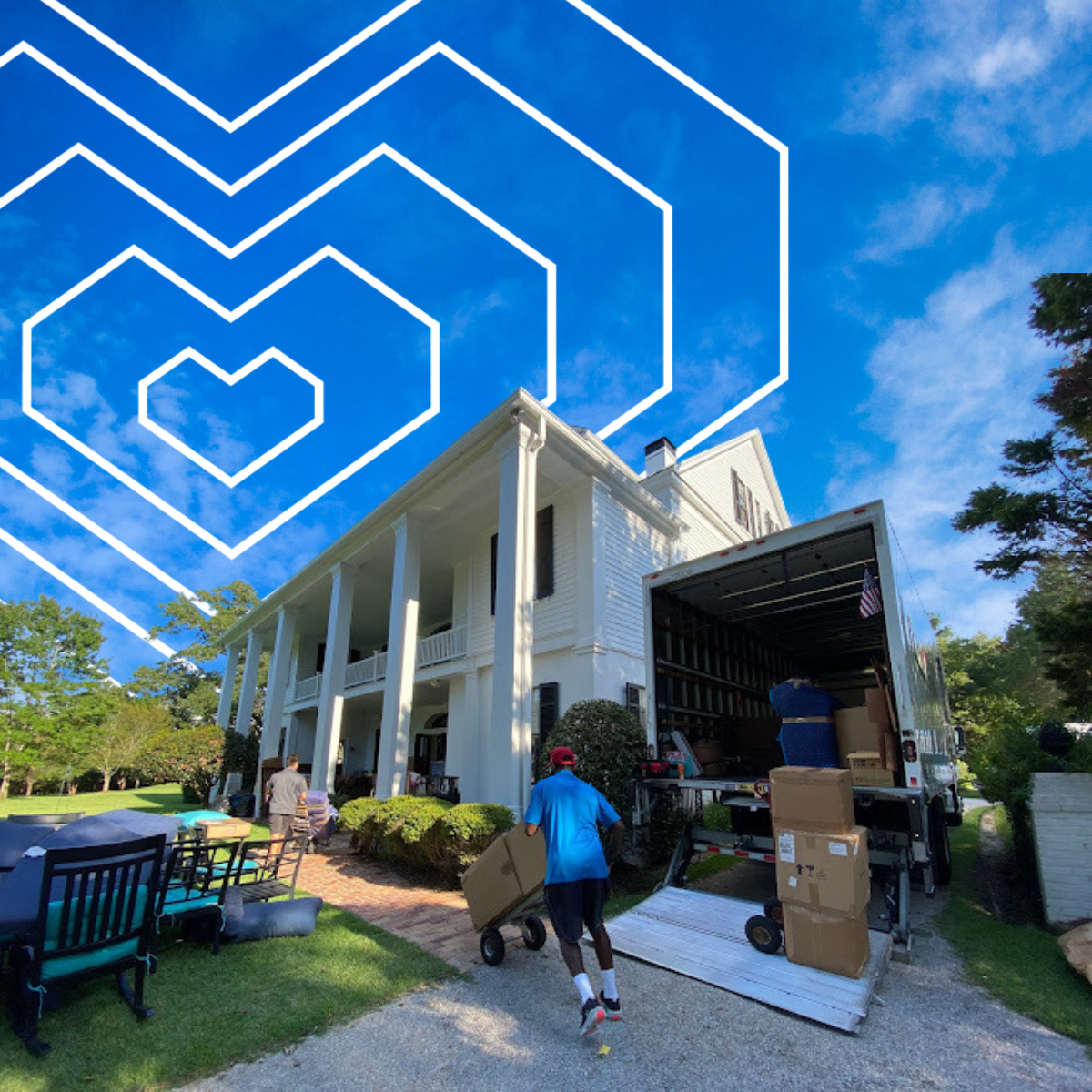 Moving day: people load boxes into a truck parked at a large white house with a blue sky and heart graphic.