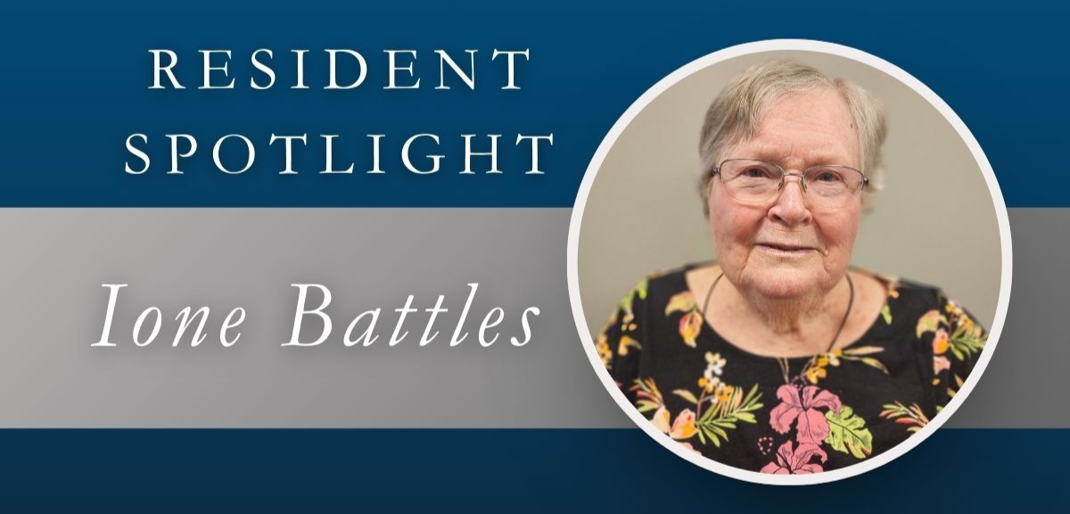 Resident Spotlight: Ione Battles, woman with glasses in a circular frame