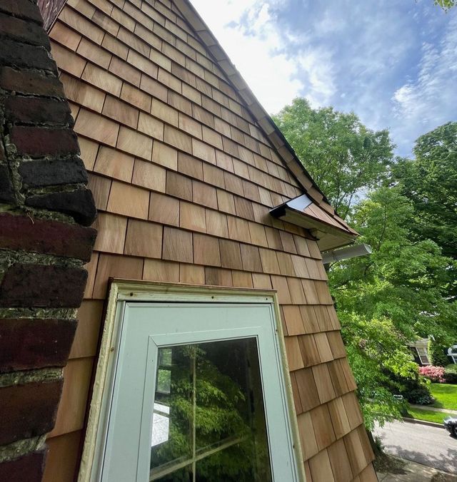 Brick chimney rebuilt and re-flashed in Middle River, MD