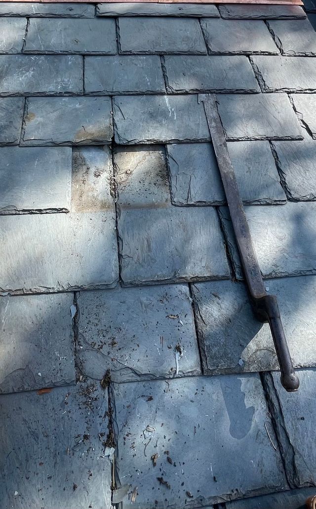 Slate roof repair on an older Baltimore home