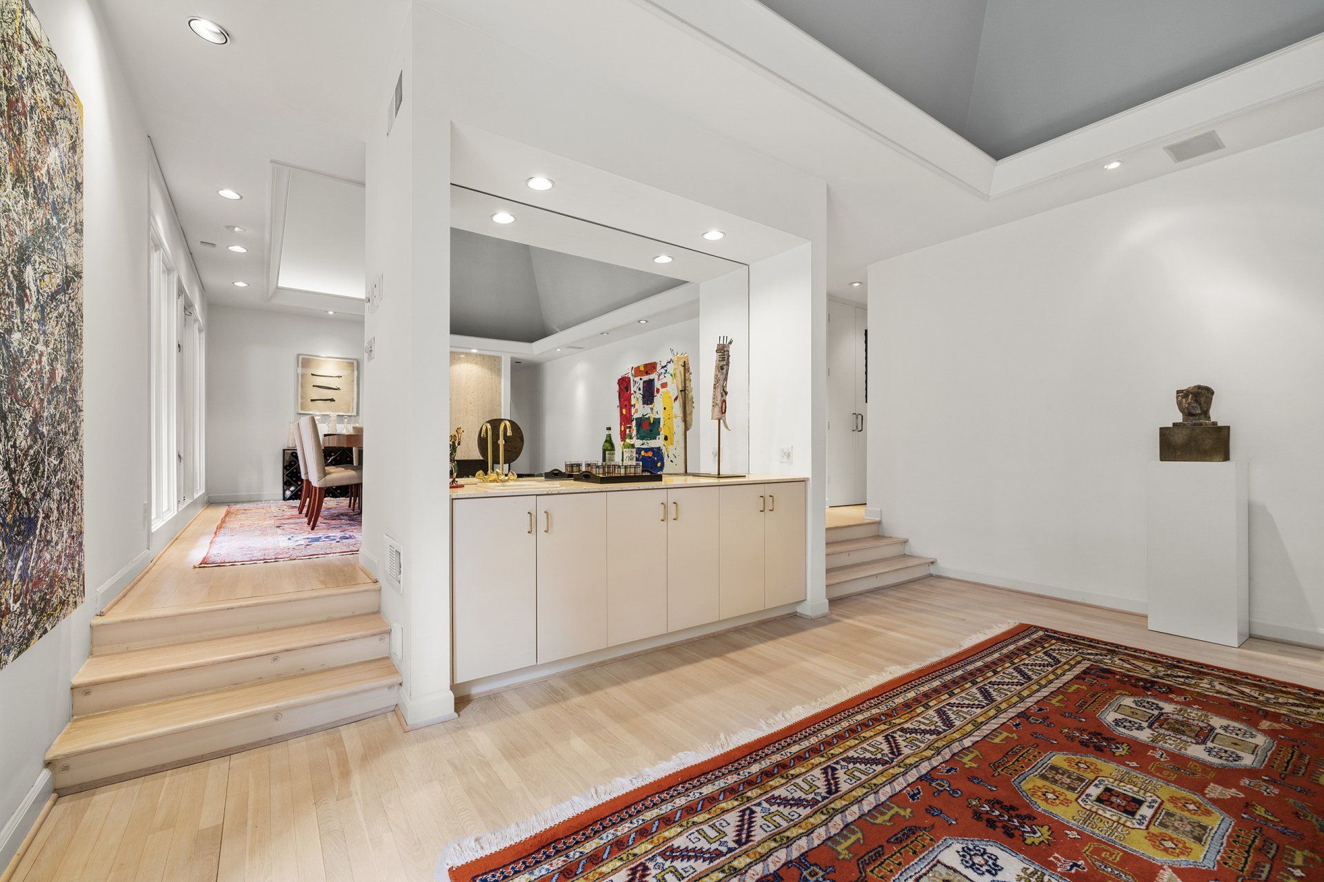 There is a rug in the middle of the room.