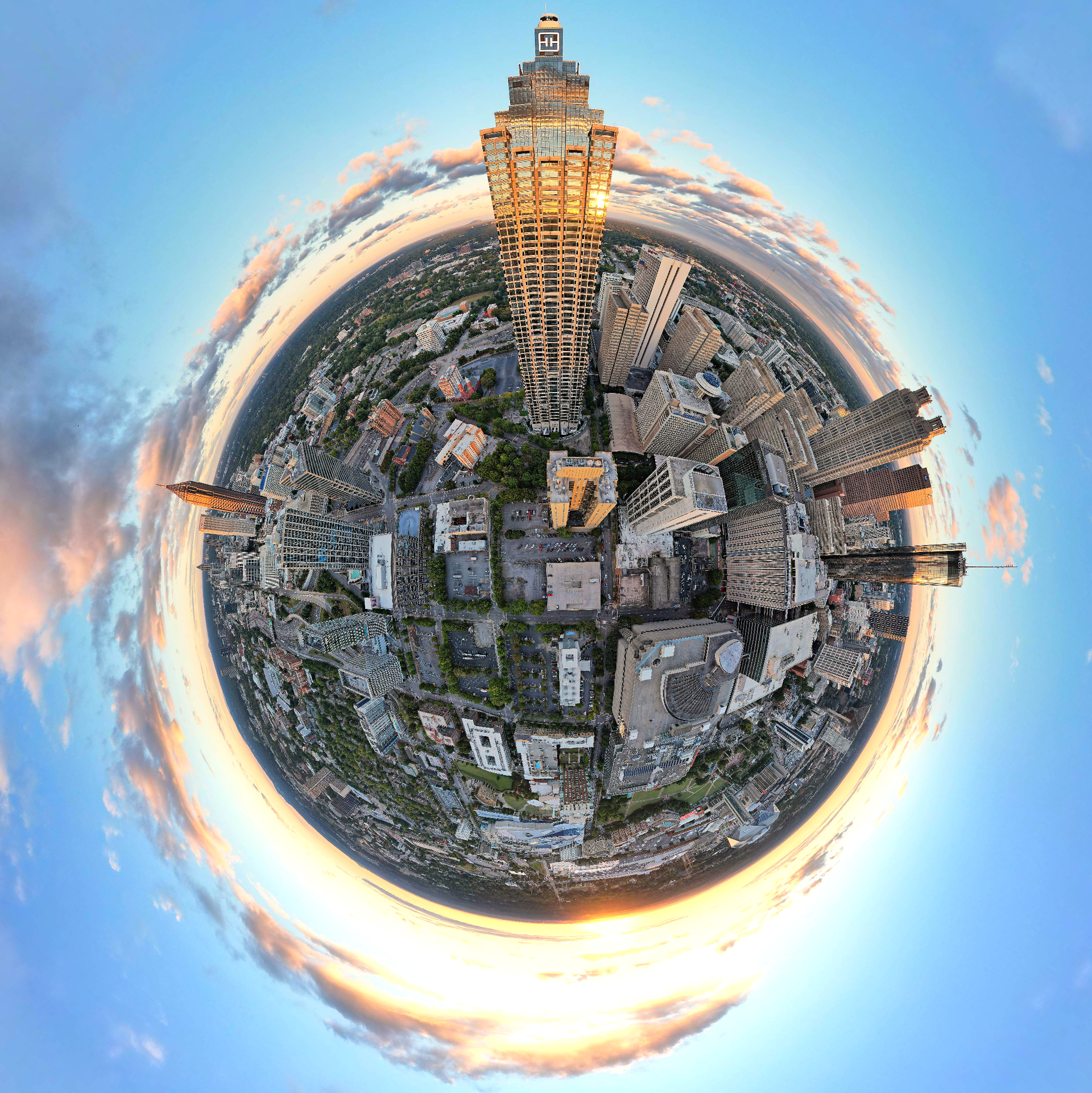 An aerial view of a city on a small planet.