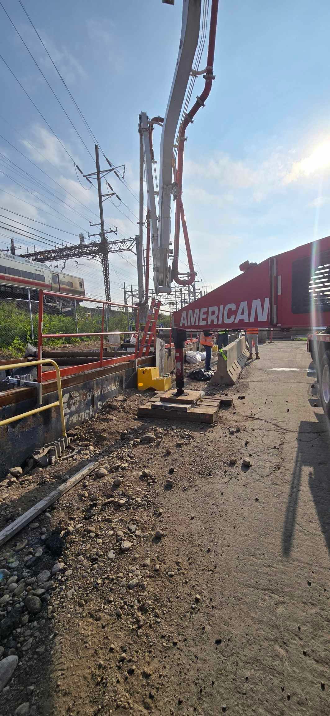 A Group of Construction Workers Are Working on A Concrete Floor - Middletown, CT - American Concrete Pumping