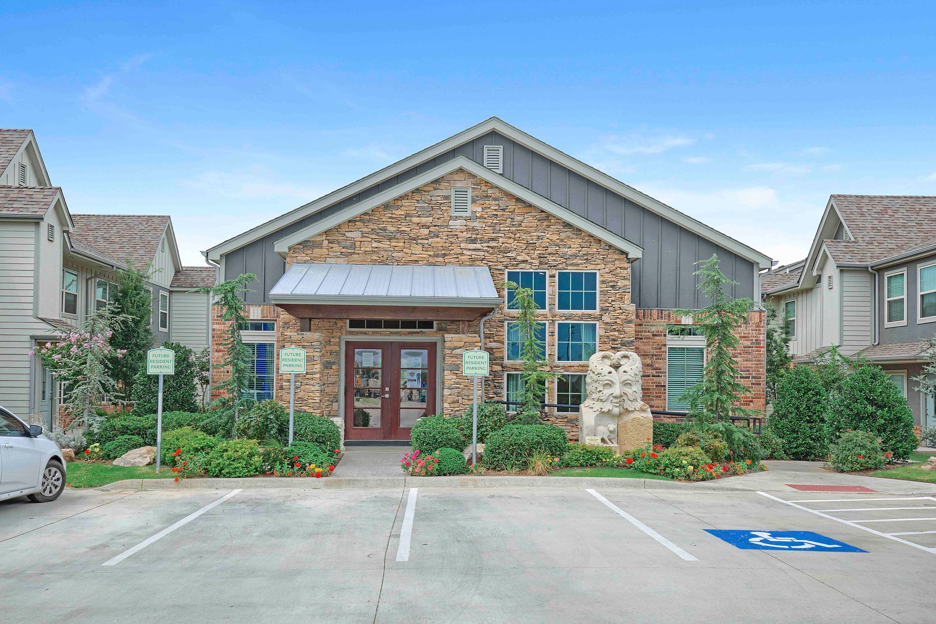 clubhouse exterior and parking spot 2
