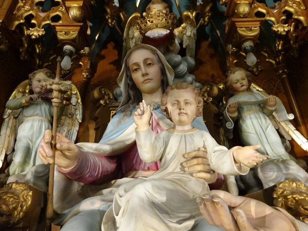 A close-up of Jesus and Mary on the throne of the high altar of St. Mary's Church