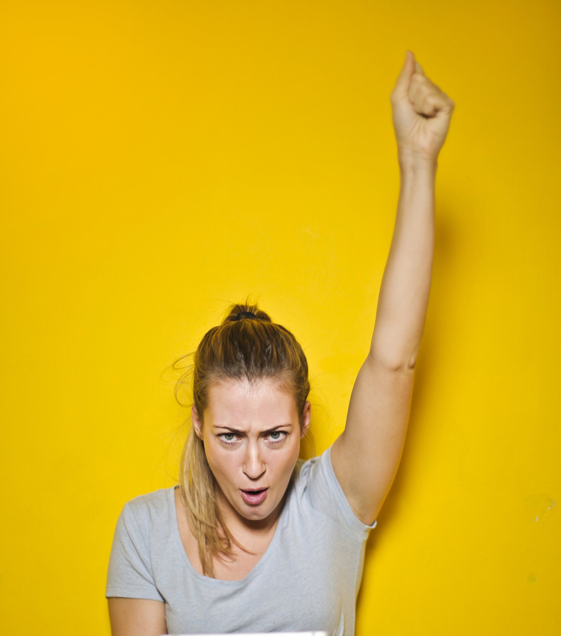 Blonde woman in power pose to do with TEC Automotive Services