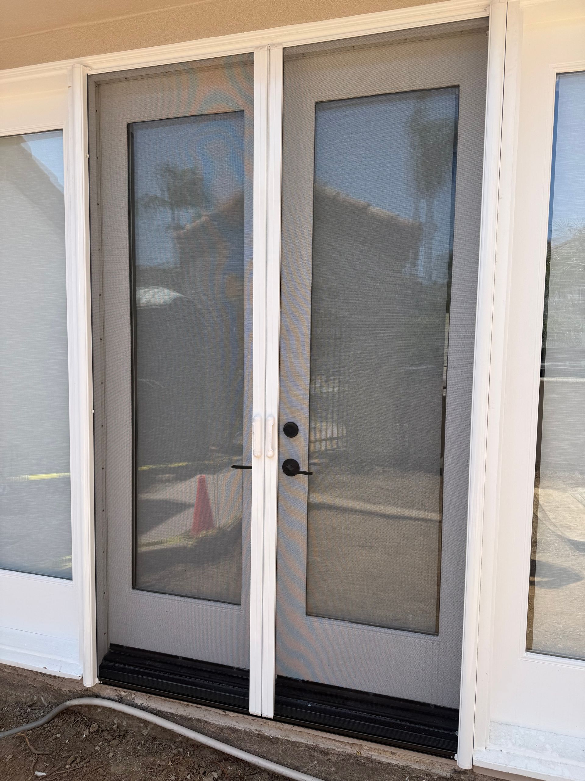Double white Clearview brand retractable screen doors
