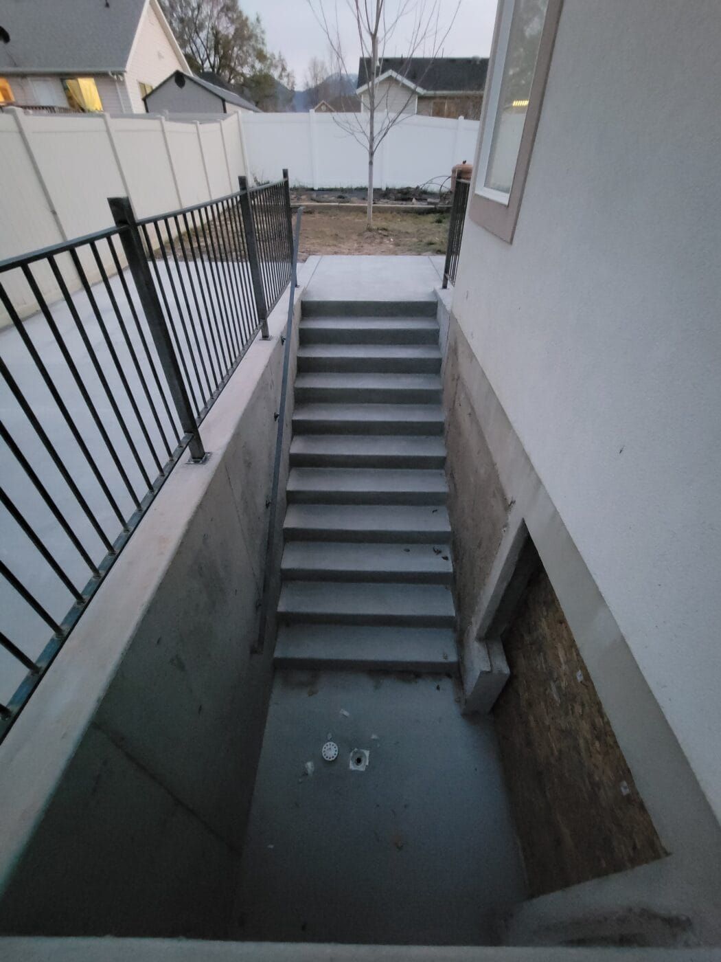A set of stairs leading up to a basement