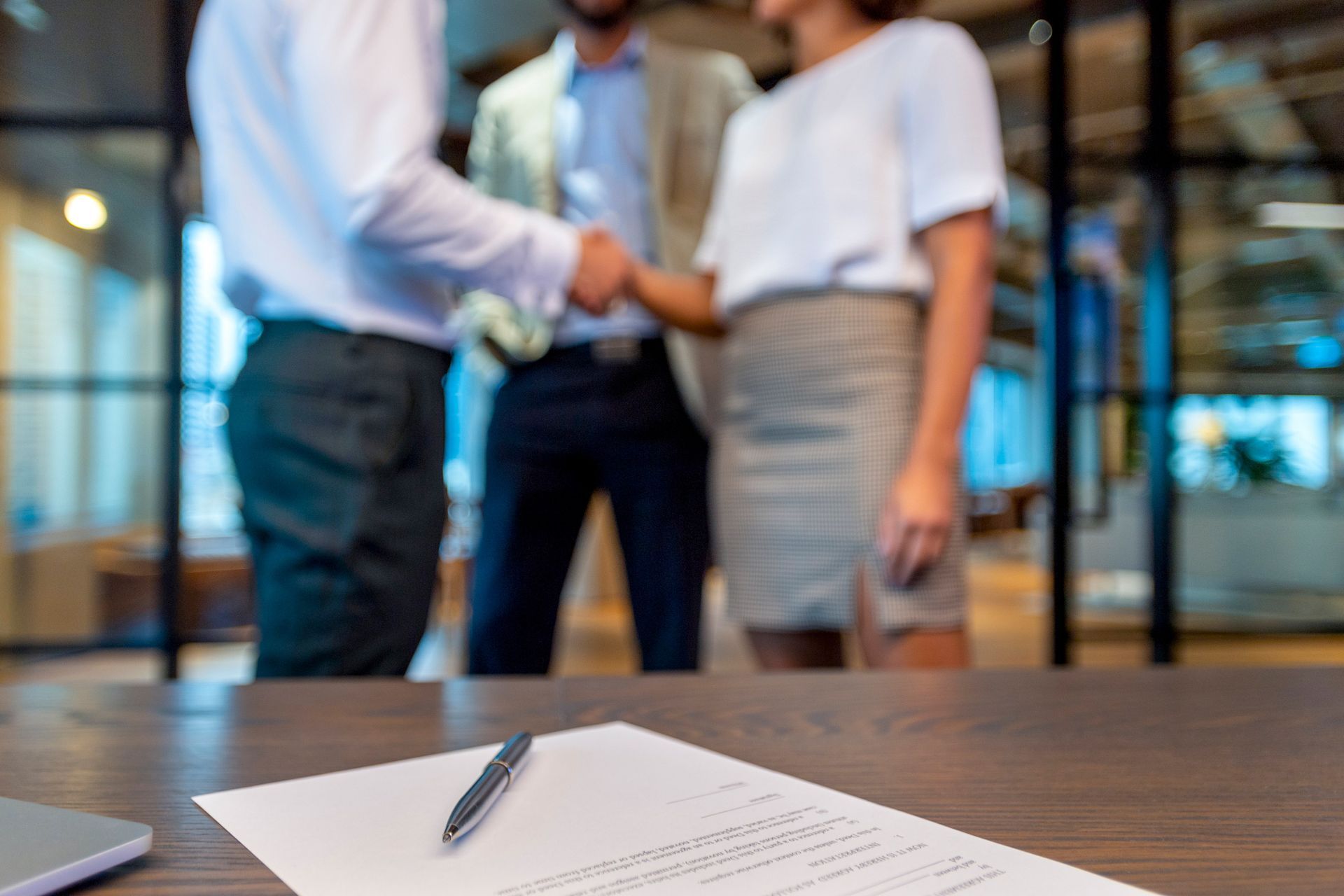 Shaking Hands With a Contract With a Third Man — Toowong, QLD — Australian Law Group Shaking Hands With a Contract With a Third Man — Toowong, QLD — Australian Law Group