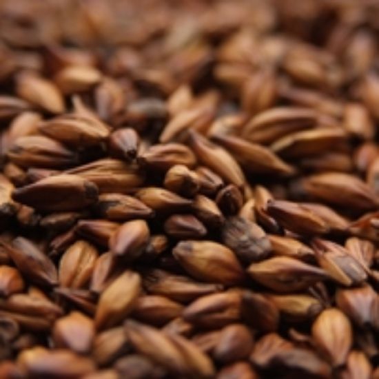 A close up of a pile of brown grains
