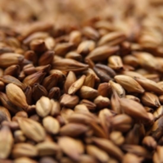 A close up of a pile of brown grains