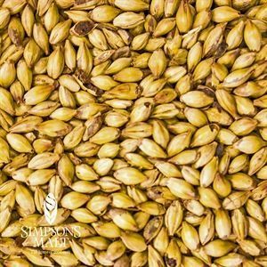 A close up of a pile of malt grains.