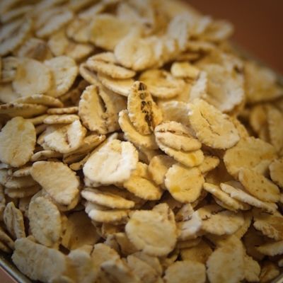 A close up of a pile of oats on a table