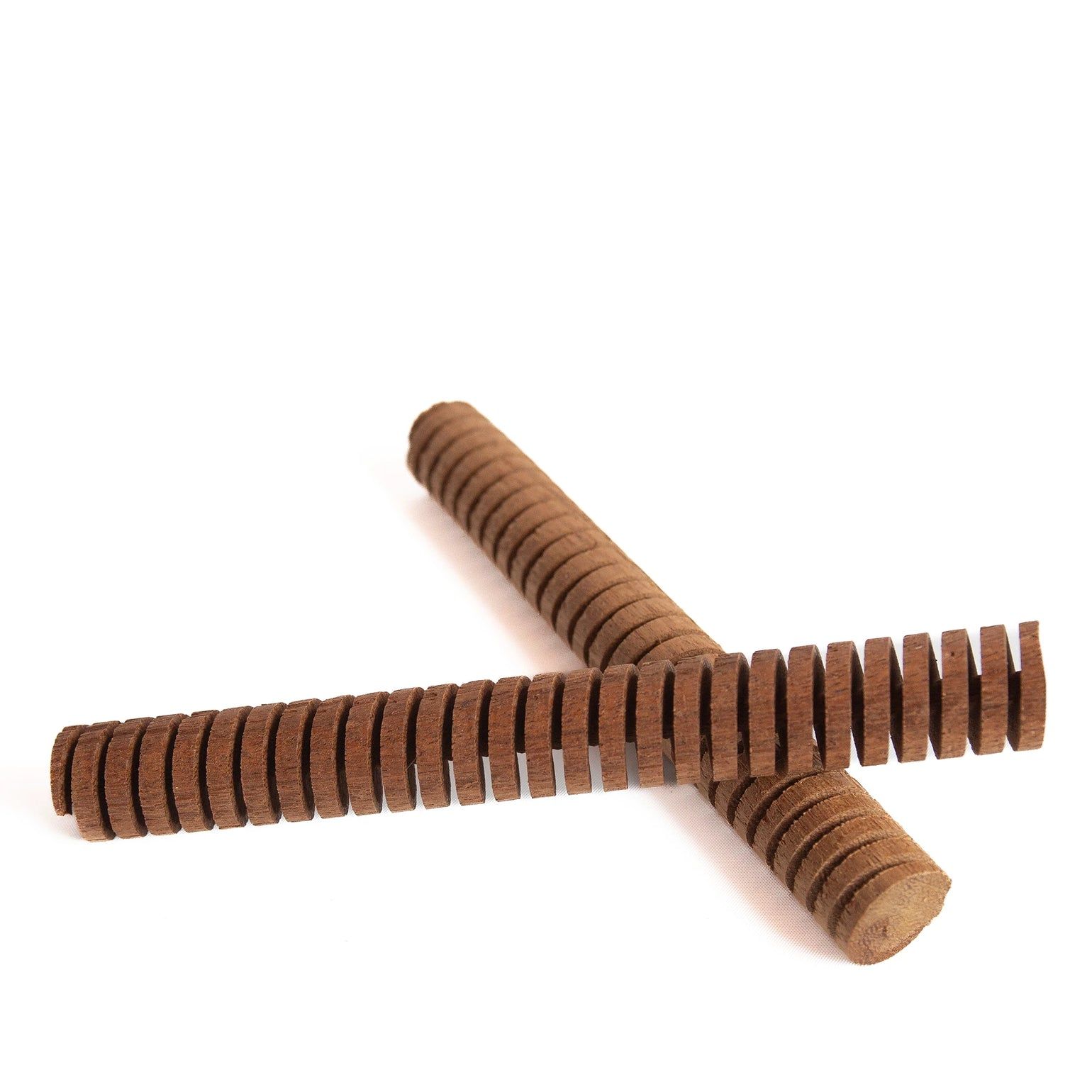 Two chocolate wafer sticks on a white background