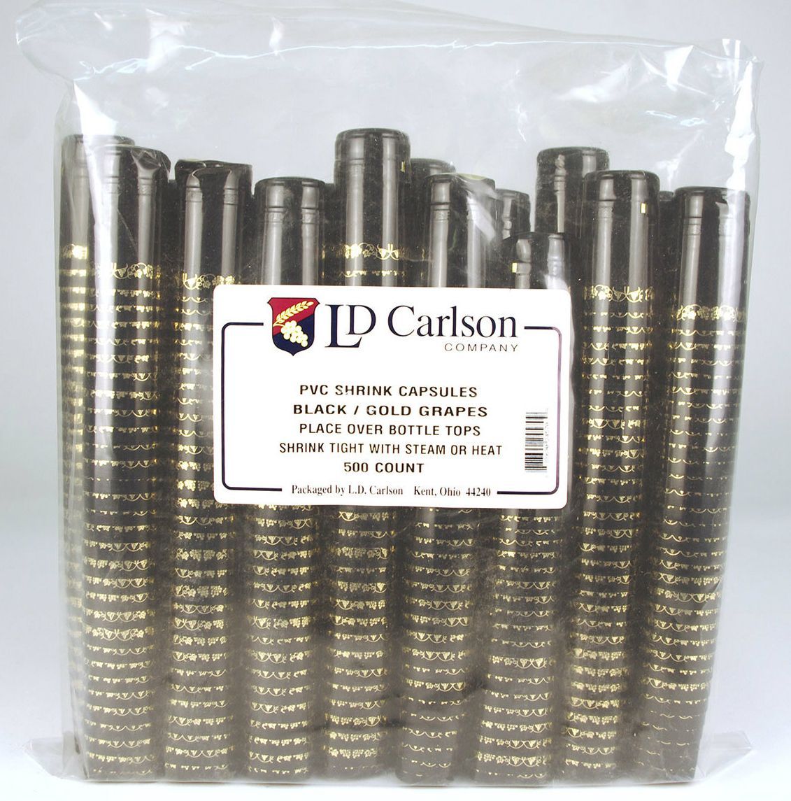 A bag of id carlson gold wrappers sitting on a table