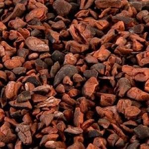 A pile of red rocks with a black background
