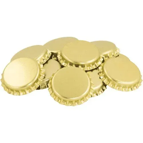 A pile of gold bottle caps on a white background