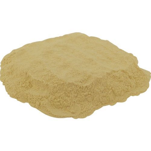 A pile of brown powder on a white background