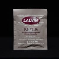 A bag of lalvin k1 v1116 sourdough starter on a black background.