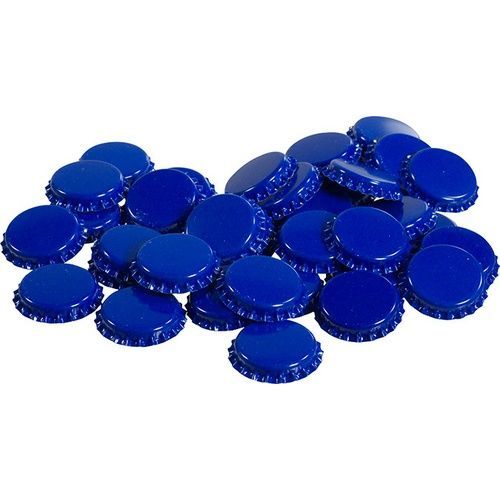 A pile of blue bottle caps on a white background
