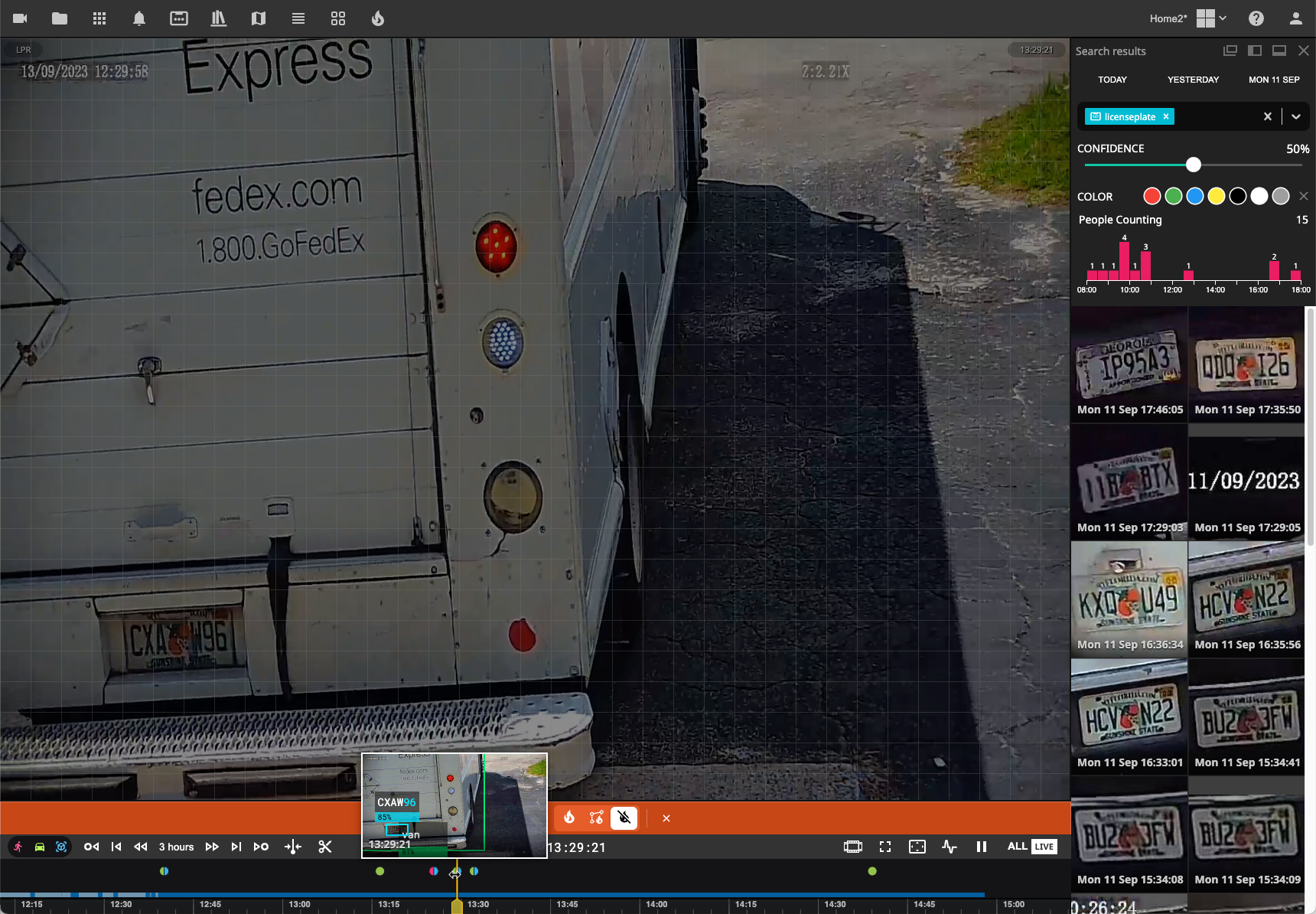 a fedex express truck is parked on the side of the road