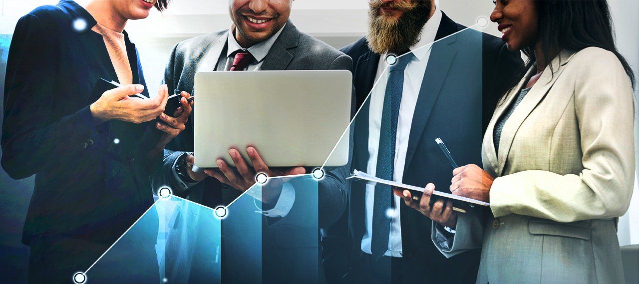 professionals focused on a laptop screen discussing online marketing professionals focused on a laptop screen discussing online marketing