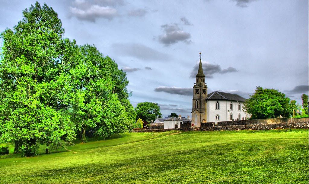 image of trees and a church in the background image of trees and a church in the background