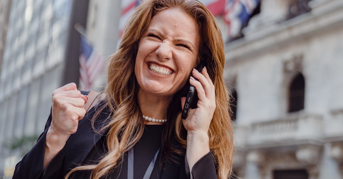 A professional smiling while taking a phone call and doing a fist pump, symbolizing success and enthusiasm, with the theme of social media strategies for personal injury law firms. A professional smiling while taking a phone call and doing a fist pump, symbolizing success and enthusiasm, with the theme of social media strategies for personal injury law firms.