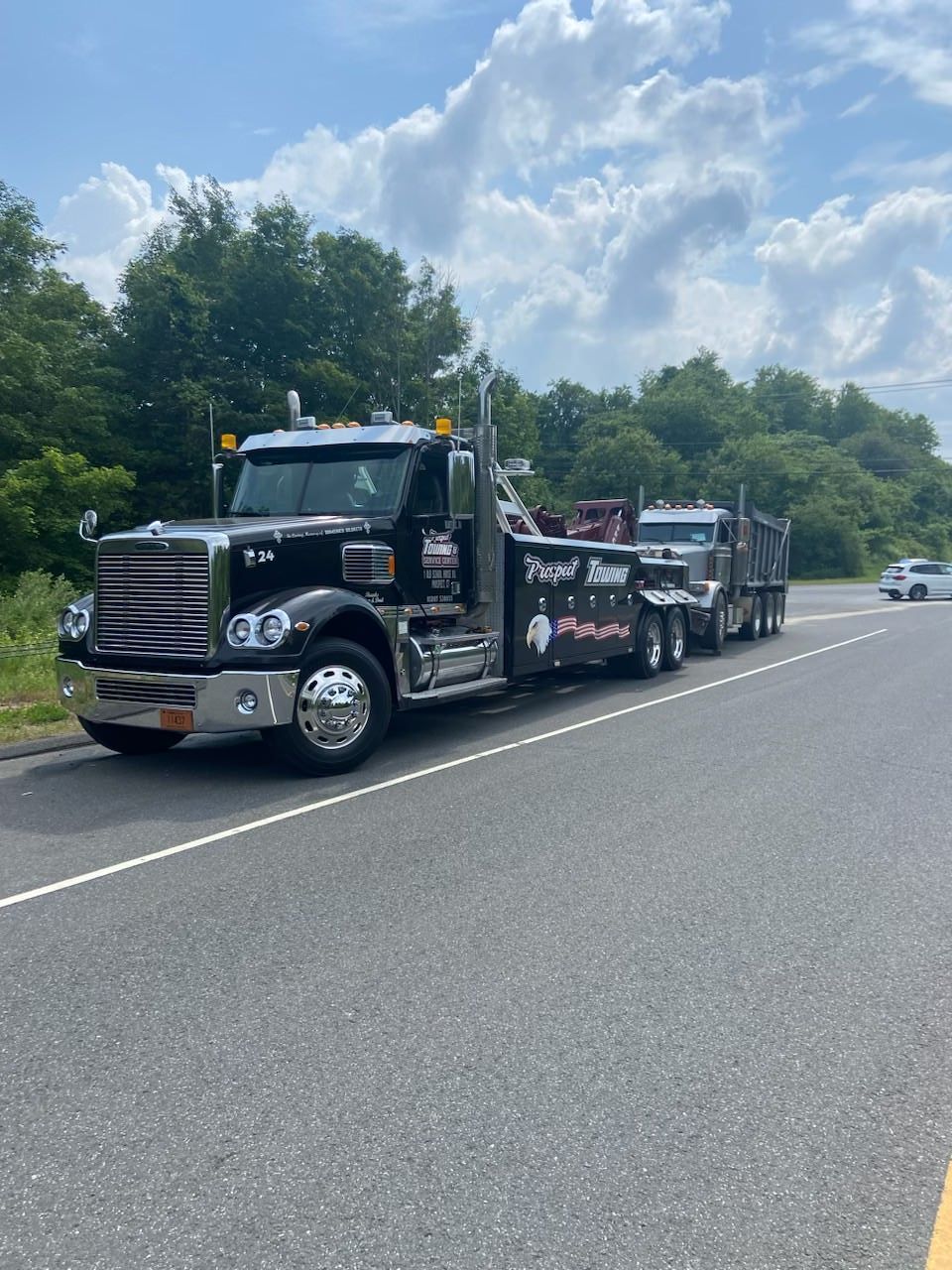 Black Tow Truck — Prospect, CT — Prospect Service & Towing Black Tow Truck — Prospect, CT — Prospect Service & Towing
