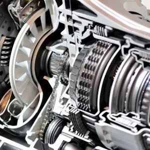 Cutaway view of an automatic transmission, showing gears, turbine, and other mechanical components.