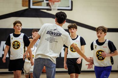 Youth volleyball player preparing to hit the ball