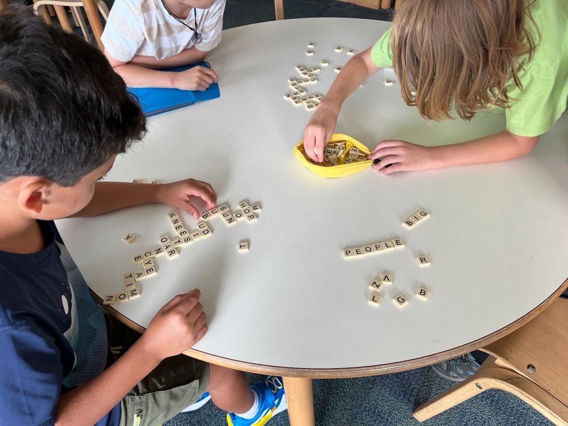Students Playing with Letters