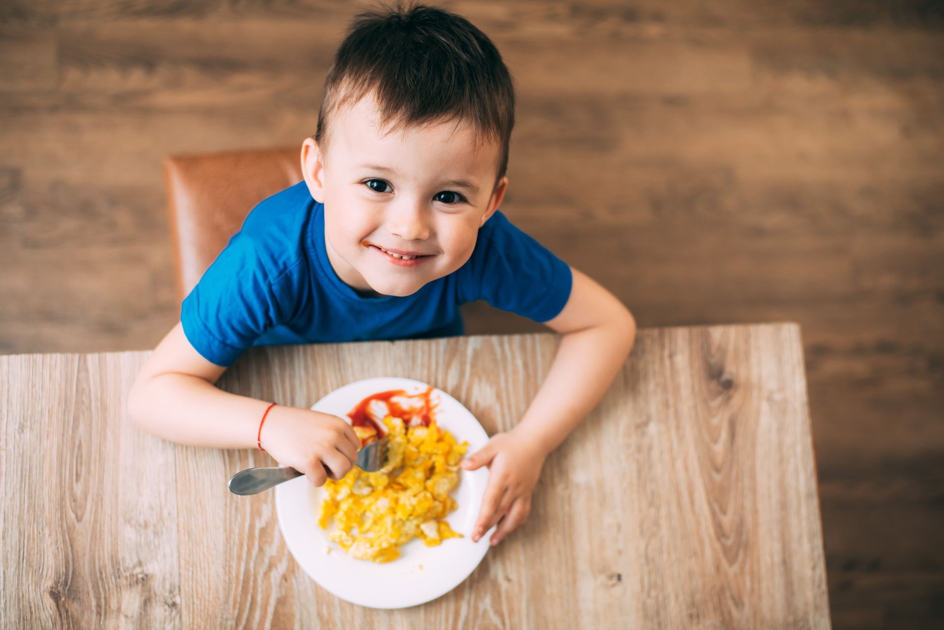 Young child at the table with a meal — Picky Eater Parenting helps parents create calm, positive mealtimes