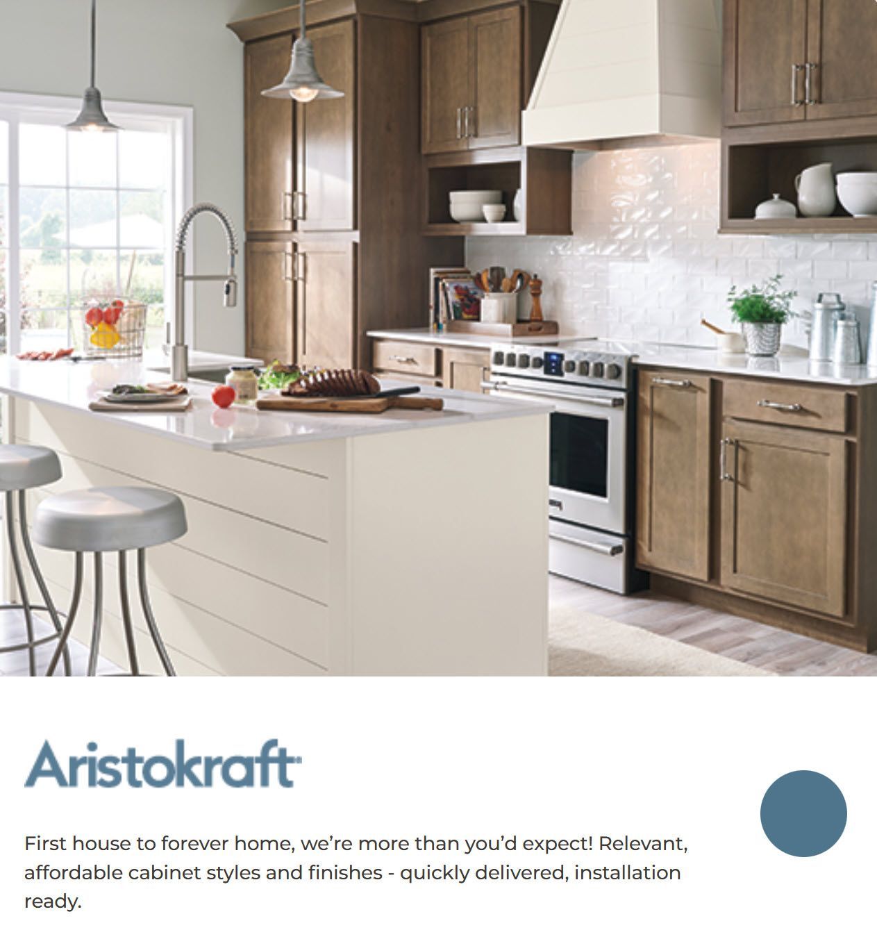 Bright modern kitchen with white island, wood cabinets, stainless stove, and pendant lighting; Aristokraft branding below