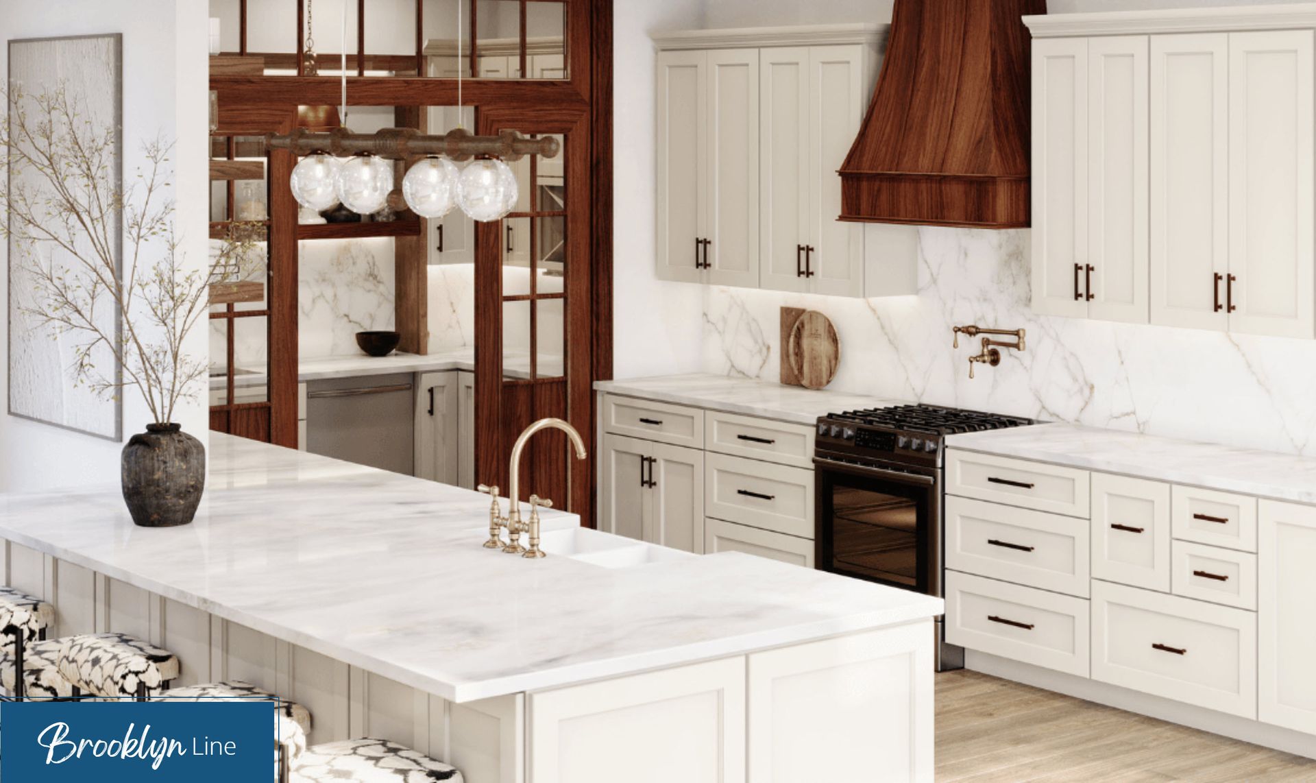 Bright white kitchen with marble island, wood accents, and pendant lights
