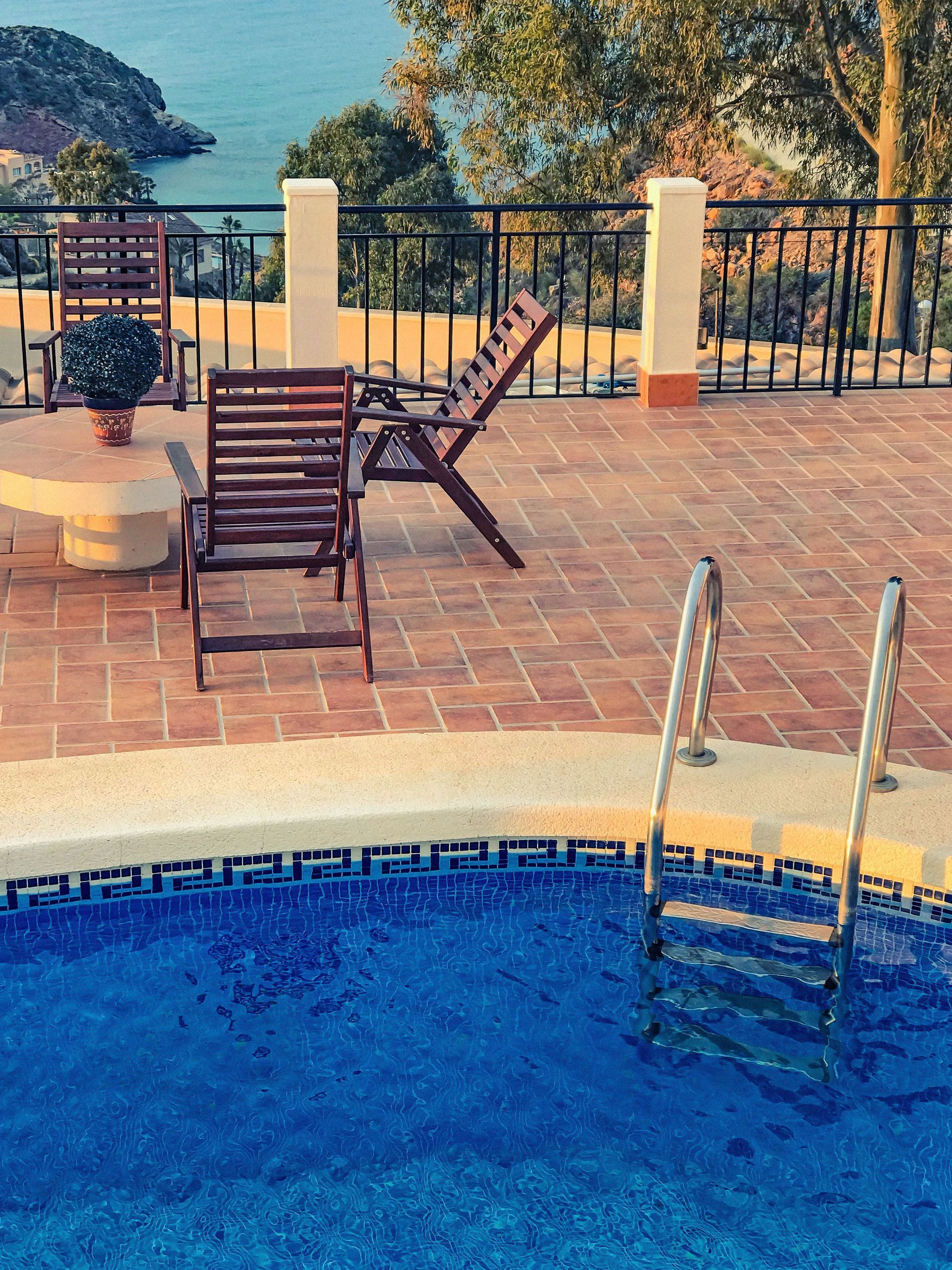 Decorative concrete pool deck with smooth finish