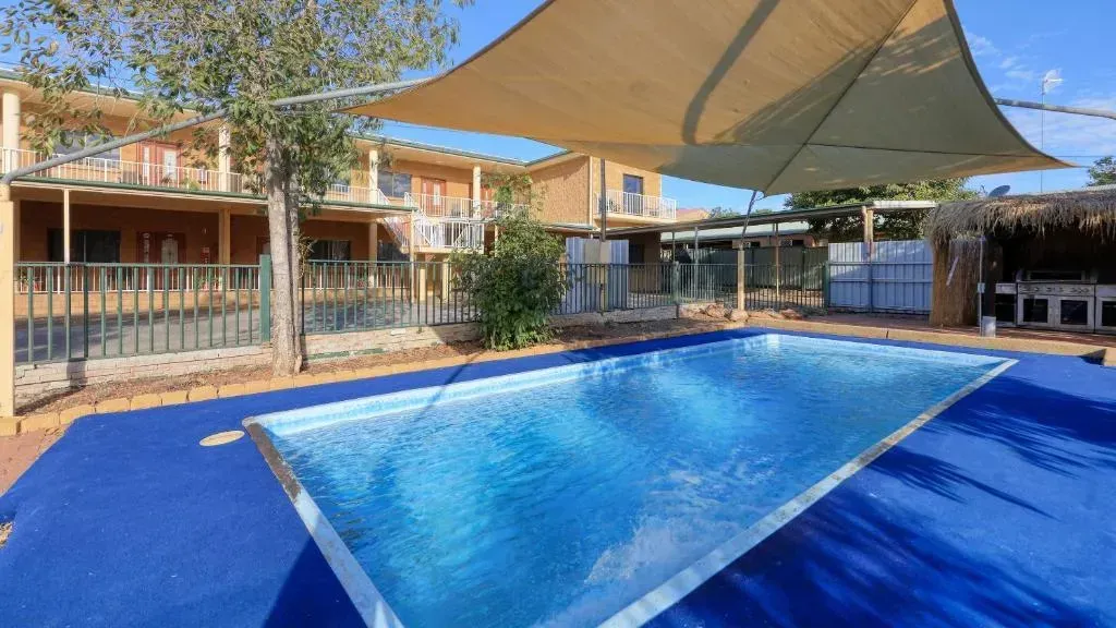 Swimming Pool in Front of A Two-Story Building — Townview Motel In Mount Isa, QLD
