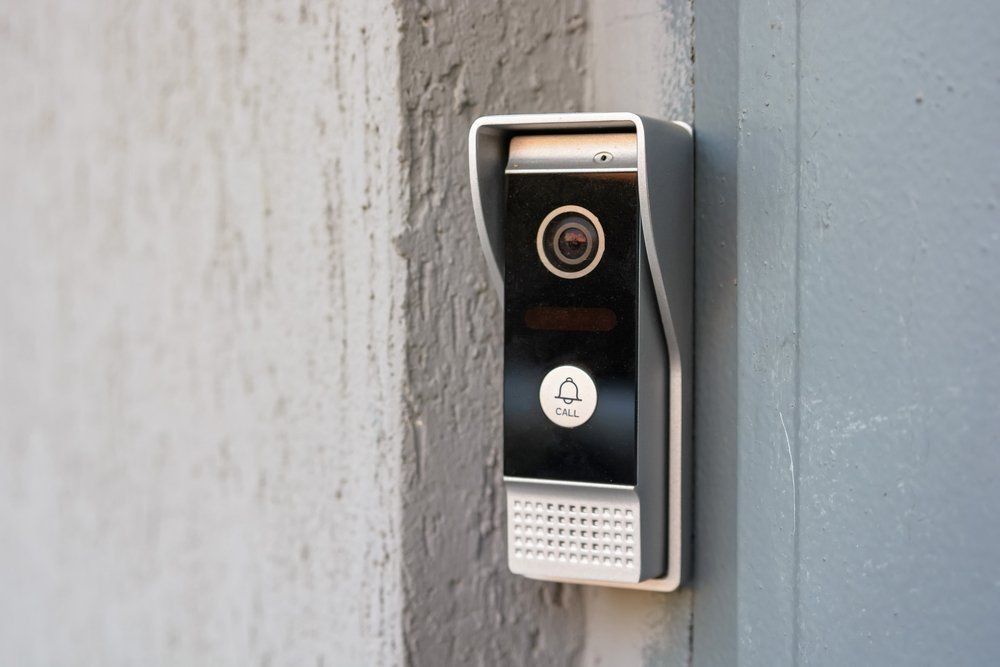A Doorbell Is Mounted On The Side Of A Building — NFL Electrical In Winya, QLD