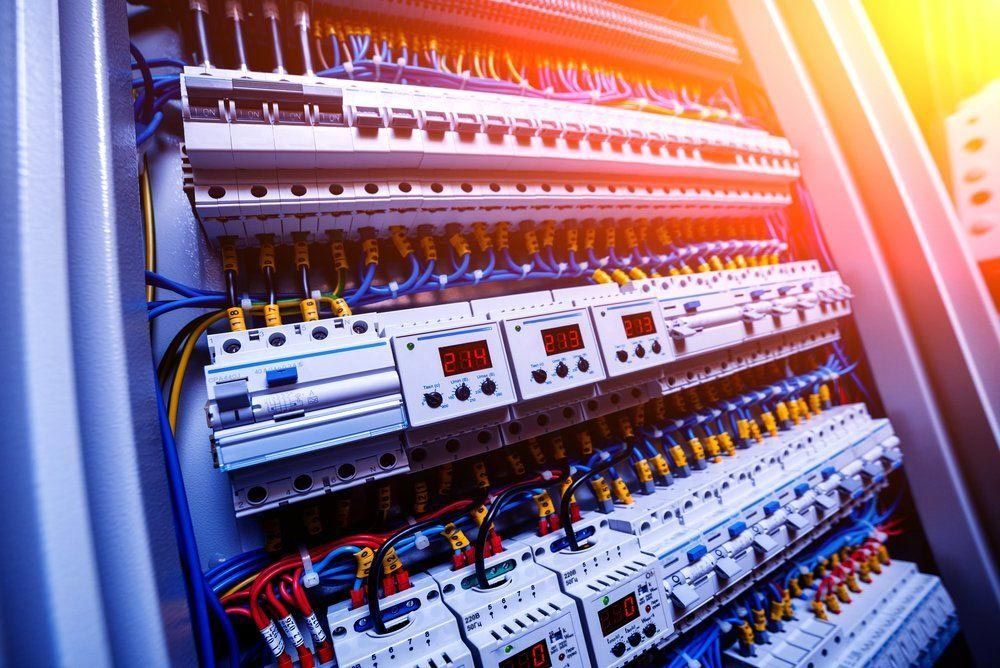 A Large Electrical Cabinet Filled With Lots Of Electrical Equipment And Wires — NFL Electrical In Stoney Creek, QLD