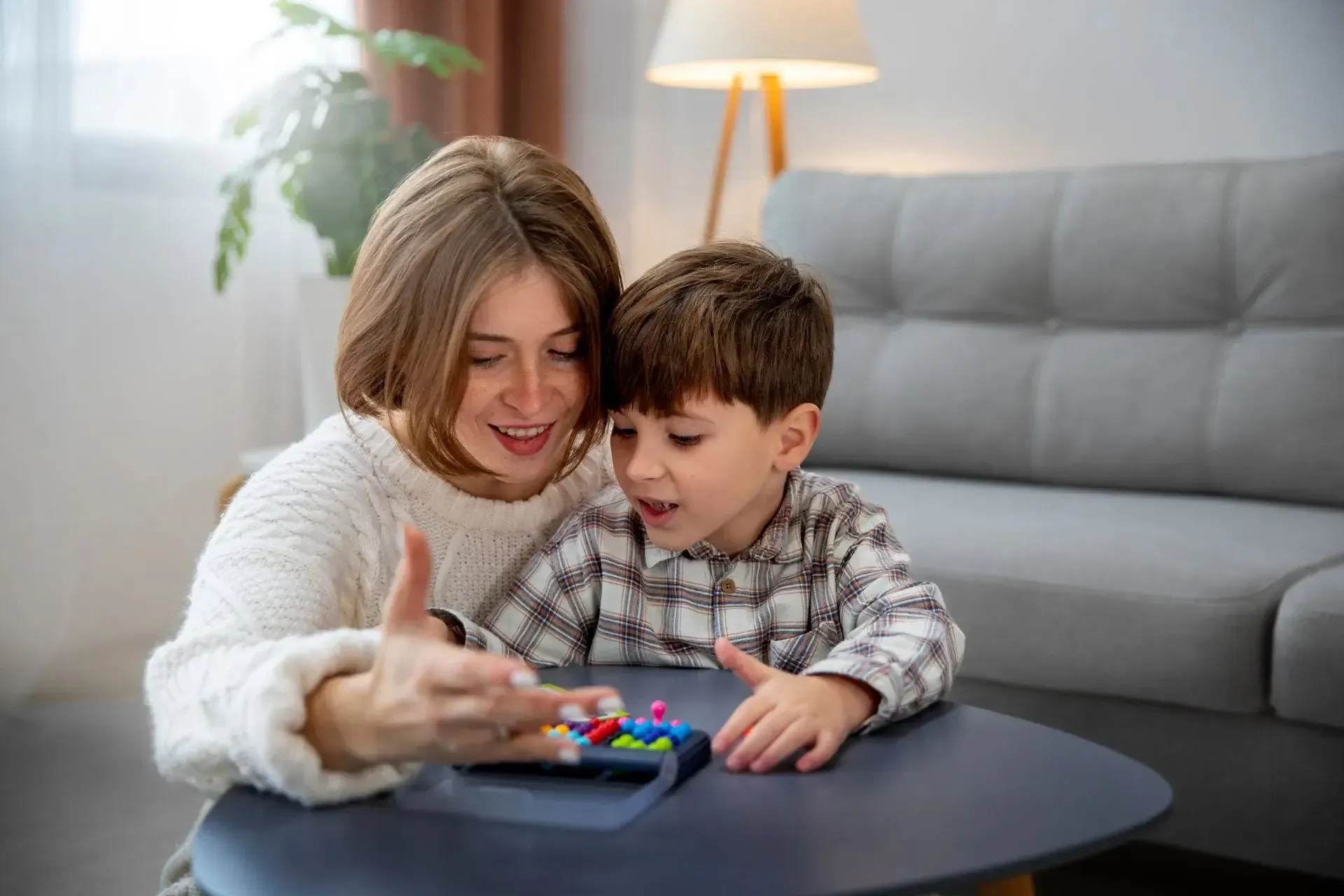 Therapist and child playing together at the Treetop Provo center
