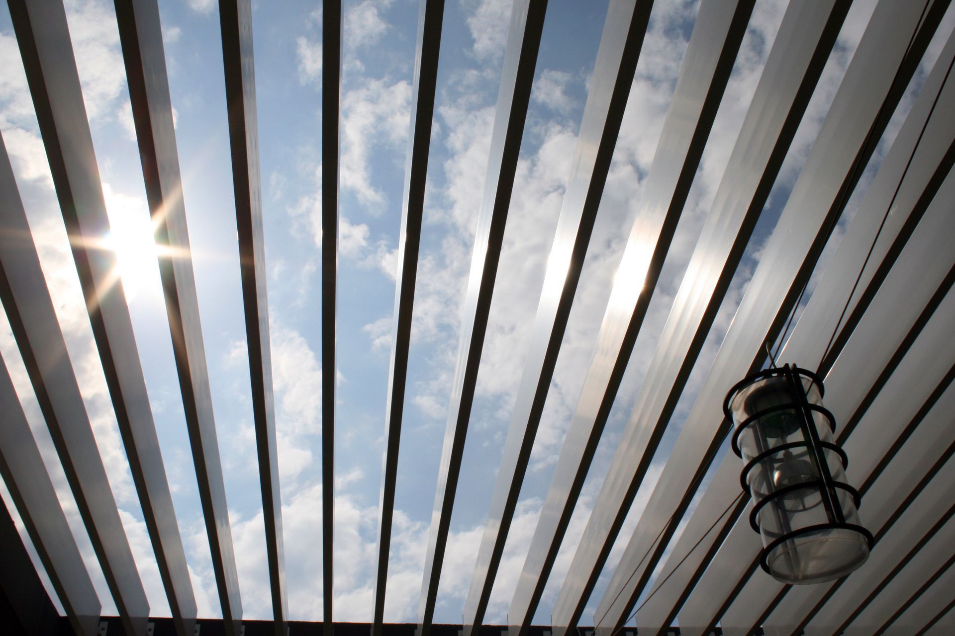 Sunlight through pergola slats
