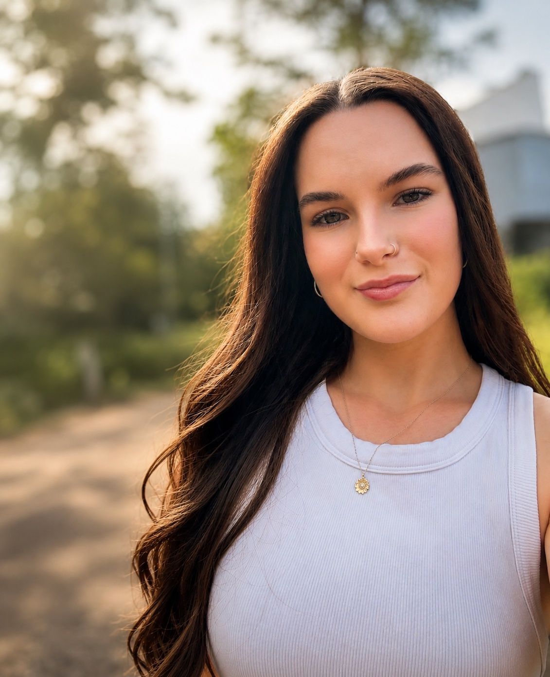 Woman With Long Dark Hair in a White Top