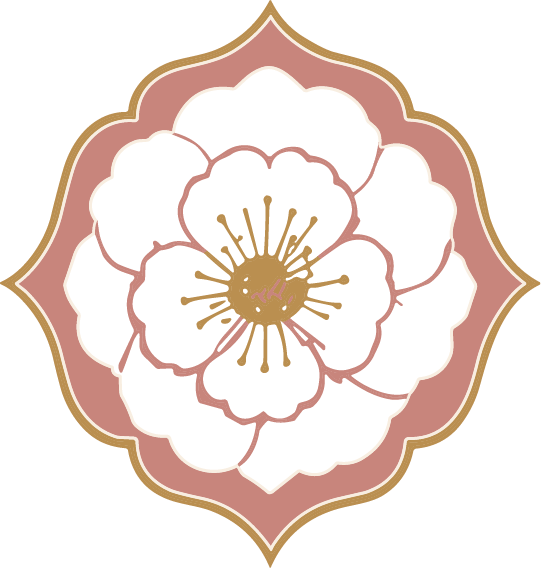 Stylized white flower with gold center inside a pink and gold decorative emblem