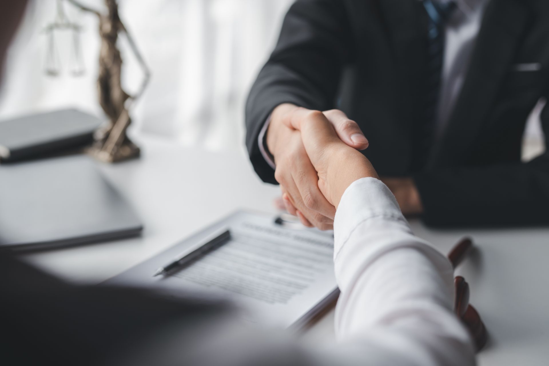 Shaking hand with attorney