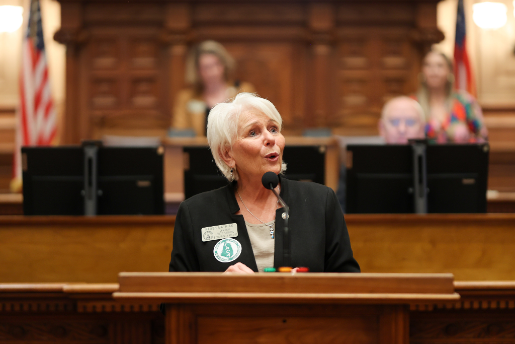 Karen Mathiak of Georgia House 82 speaking at the podium.