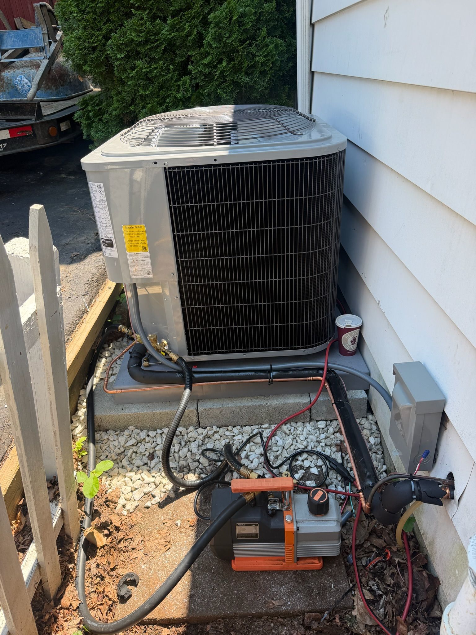 Residential air conditioning condenser installation