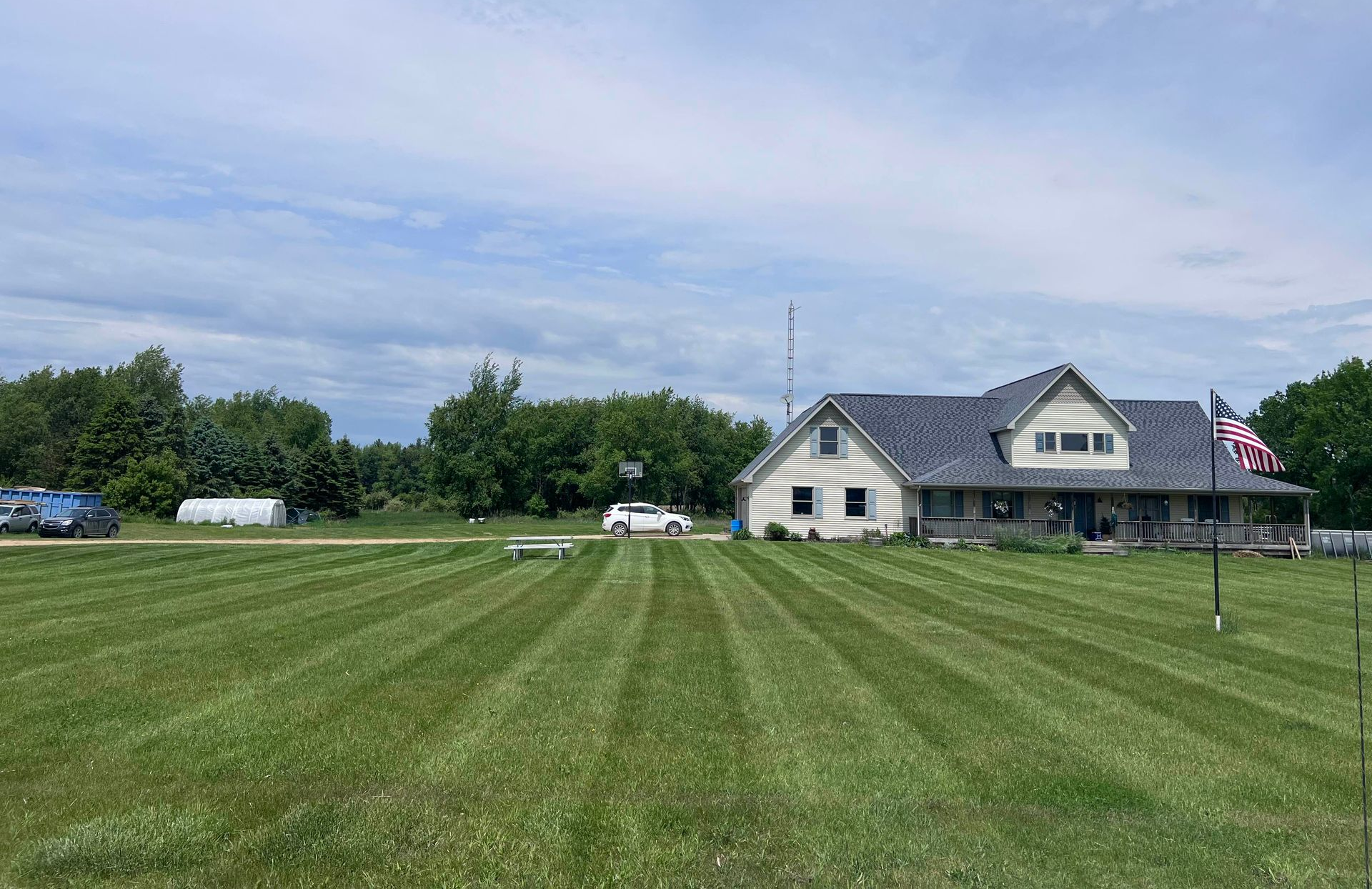 Lawn mowing service in Lapeer, MI with clean stripe pattern